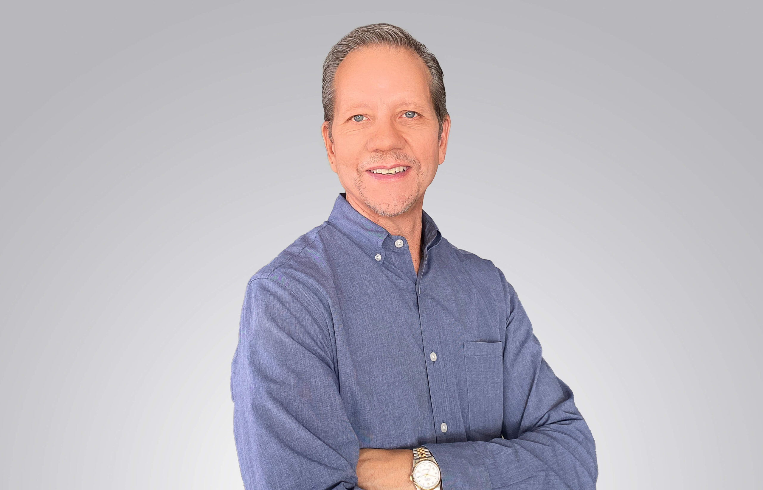 A professional photo of Tony Paquin.